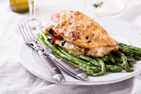 Grilled chicken breast stuffed with mozzarella
