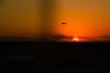 Airplane at sunrise