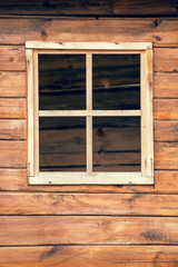 Window and wooden wall