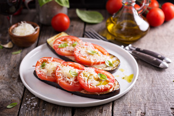 Grilled zucchini with tomatoes and cheese