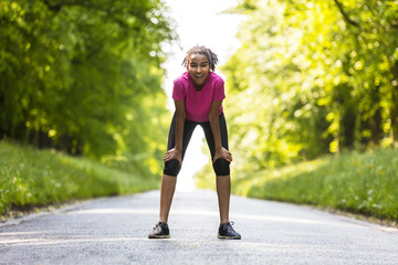 Mixed Race African American Woman Teenager Fitness Running - Powered by Adobe