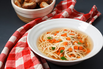 Dietary soup with carrot, greens and macaroni