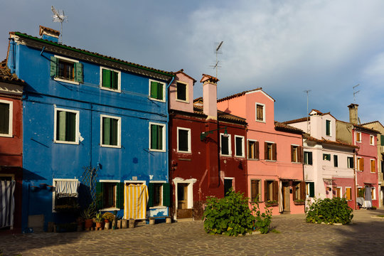 The Venetian island of Burano may well be the most colorful town in the world, with no two houses next to each other painted the same color.