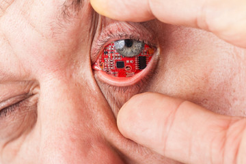 Man with a circuit board in his eye
