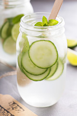 Lime and cucumber lemonade in mason jars