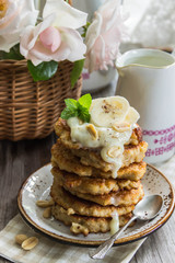 oat pancake with vanilla sauce, bananas,peanuts for Breakfast