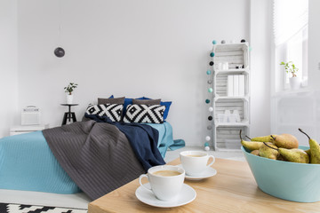Coffee for two in modern bedroom