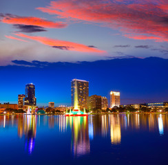 Fototapeta na wymiar Orlando skyline sunset at lake Eola Florida US