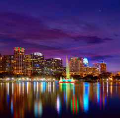 Fototapeta premium Orlando skyline sunset at lake Eola Florida US