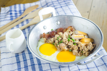 pan-fried egg with Chinese sausage, minced pork