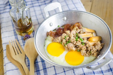 pan-fried egg with Chinese sausage, minced pork