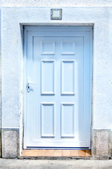 white closed door closeup