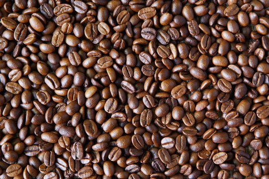 Coffee Beans background, arabika texture © Prostock-studio