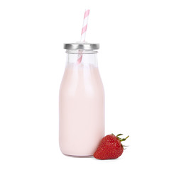 Drinks and milk shakes - a strawberry milkshake in a vintage glass bottle with straw isolated on a white background