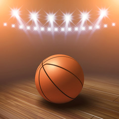 Obraz premium Ball on basketball court with spotlights , Basketball arena