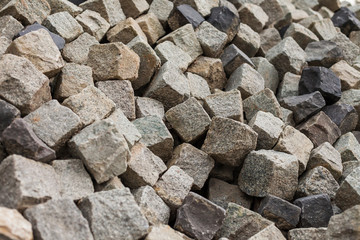 Pile of cubic stones for paving