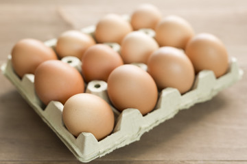 Chicken eggs in an egg cup