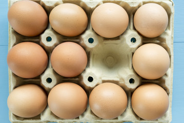 Chicken eggs in an egg cup