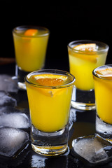 Cocktail with orange and ice