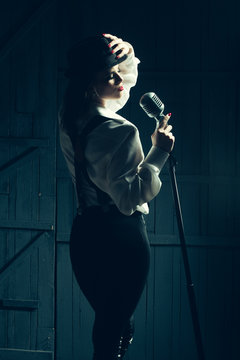 retro woman with microphone