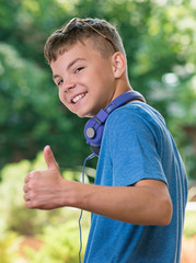 Boy showing thumbs up 