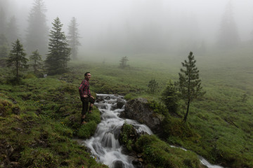 Fototapeta premium Man in traditional Lederhosen in the Nature of Austria