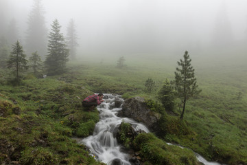 Man in traditional Lederhosen in the Nature of Austria