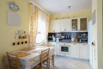 Interior of a guest house room with kitchen