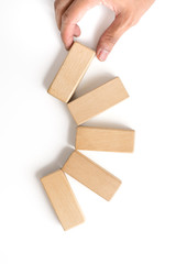 Hand aranging wood block stacking as step stair.