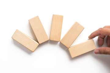 Hand aranging wood block stacking as step stair.