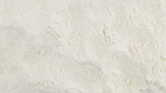 White wheat flour rotate. White wheat flour clockwise rotation . Close up