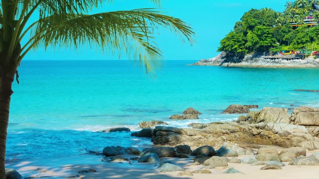 FullHD video - Luxury beach resort, secluded amongst the trees, overlooking a stunning, tropical beach paradise on the Andaman Sea in Kamala, Phuket, Thailand. With sound.