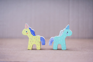 Wooden colorful unicorn horses