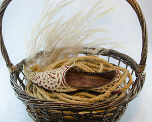 Indian shoe king wicker brown basket isolated on white