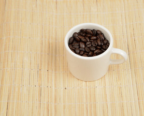  coffee beans in cup 