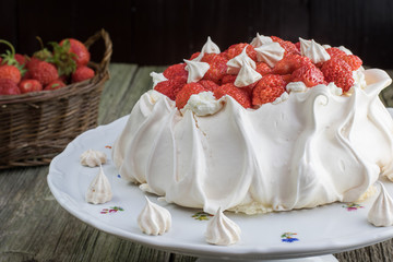 Strawberries Pavlova Cake on a White Dessert Plate