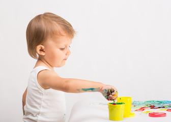 baby draws a finger paints