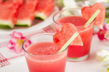 Watermelon drinks in glasses with heart of watermelon