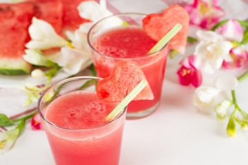 Watermelon drinks in glasses with heart of watermelon