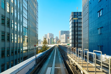 Fototapeta na wymiar Cityscape from Yurikamome monorail in Odaiba, Taokyo