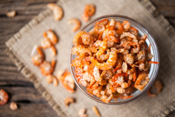 Dried shrimp in bowl on sackcloth