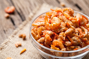 Dried shrimp in bowl on sackcloth