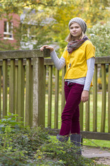 young girl in the autumn park