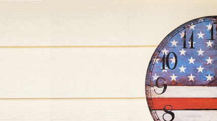 USA flag on clock with wooden wall
