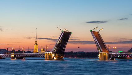 Fototapeta na wymiar Palace bridge, Peter and Paul Cathedral summer night. Saint Petersburg