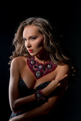 Naklejka premium Luxury life and glamour. Pretty model touts jewels