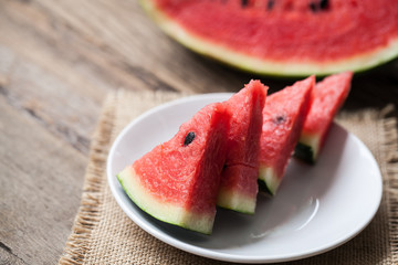 Watermelon on wooden background