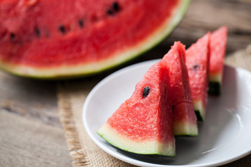 Watermelon on wooden background