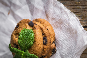 chocolate chip cookies on rustic wooden table