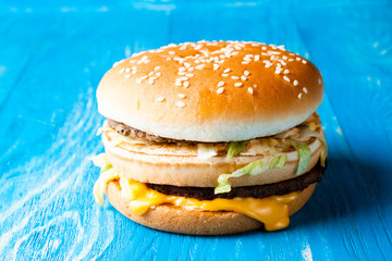 Burger full face with vegetables.